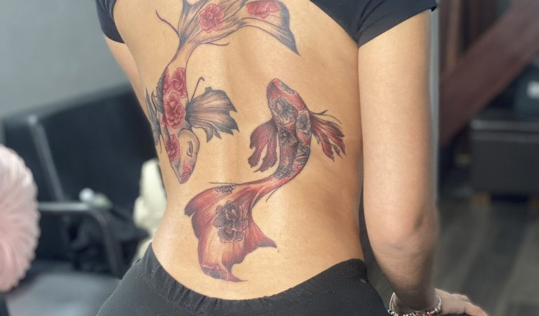 Koi fish tattoo on the back