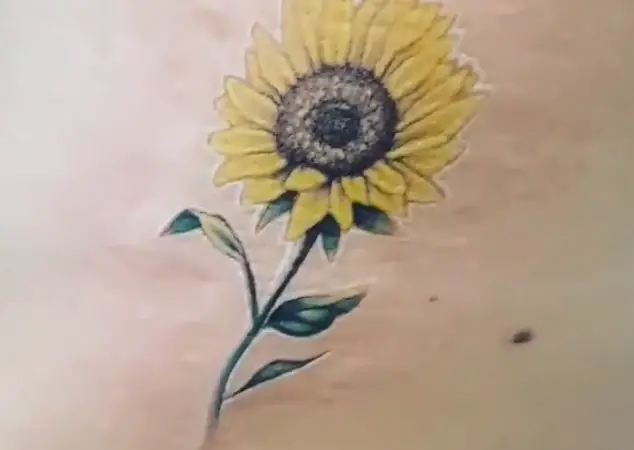 Realistic Sunflower Tattoo Revealing