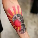Rising Sun With Waves Tattoo